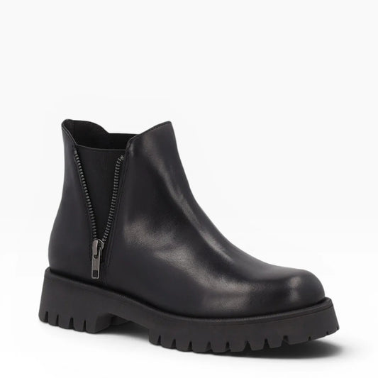 Frau - Beatles donna in pelle nera con cerniera laterale.