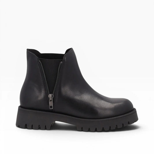Frau - Beatles donna in pelle nera con cerniera laterale.