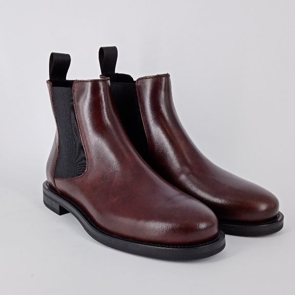 FRAU . Beatles in pelle caffè .