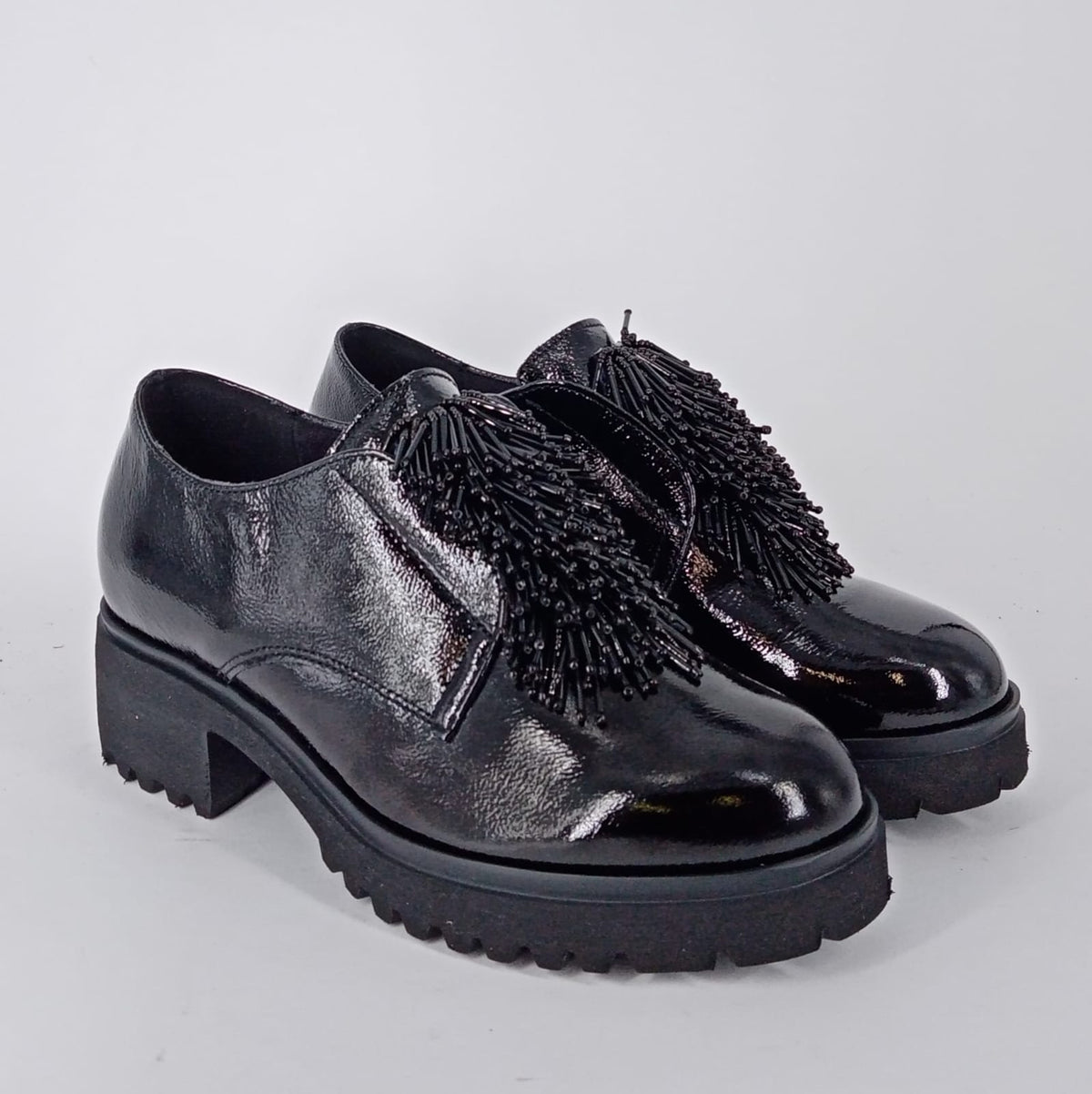 Maral Shoes - Scarpe in vernice nera.  -30%