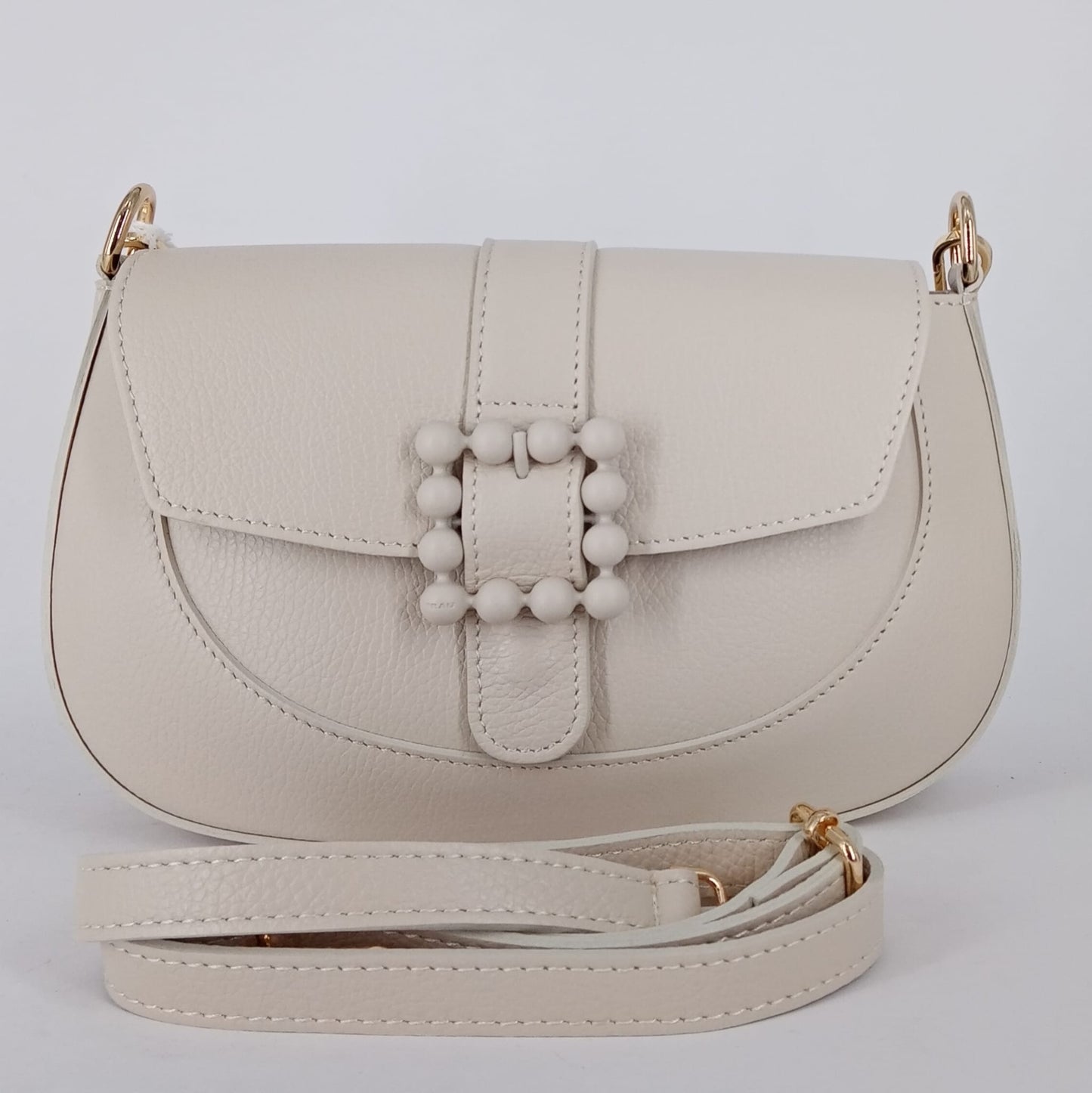 Frau - Borsa in pelle beige con accessorio.