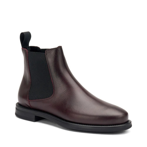 Frau - Beatles in pelle bordeaux.