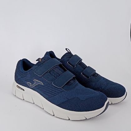 JOMA - Ginnica in tessuto blu con strappi . -